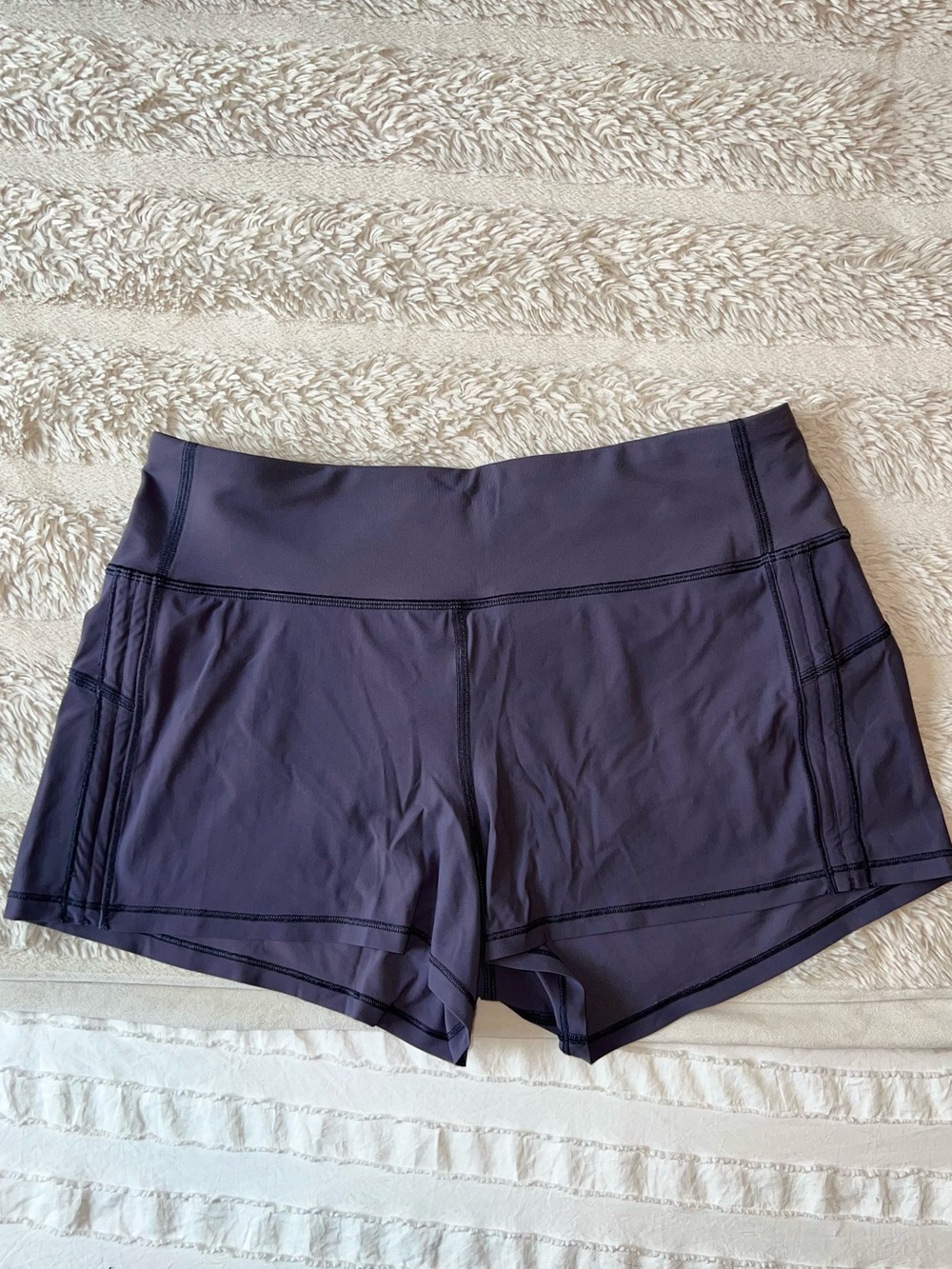 Like new Lululemon Women’s mid rise-Waist Purple Active Shorts